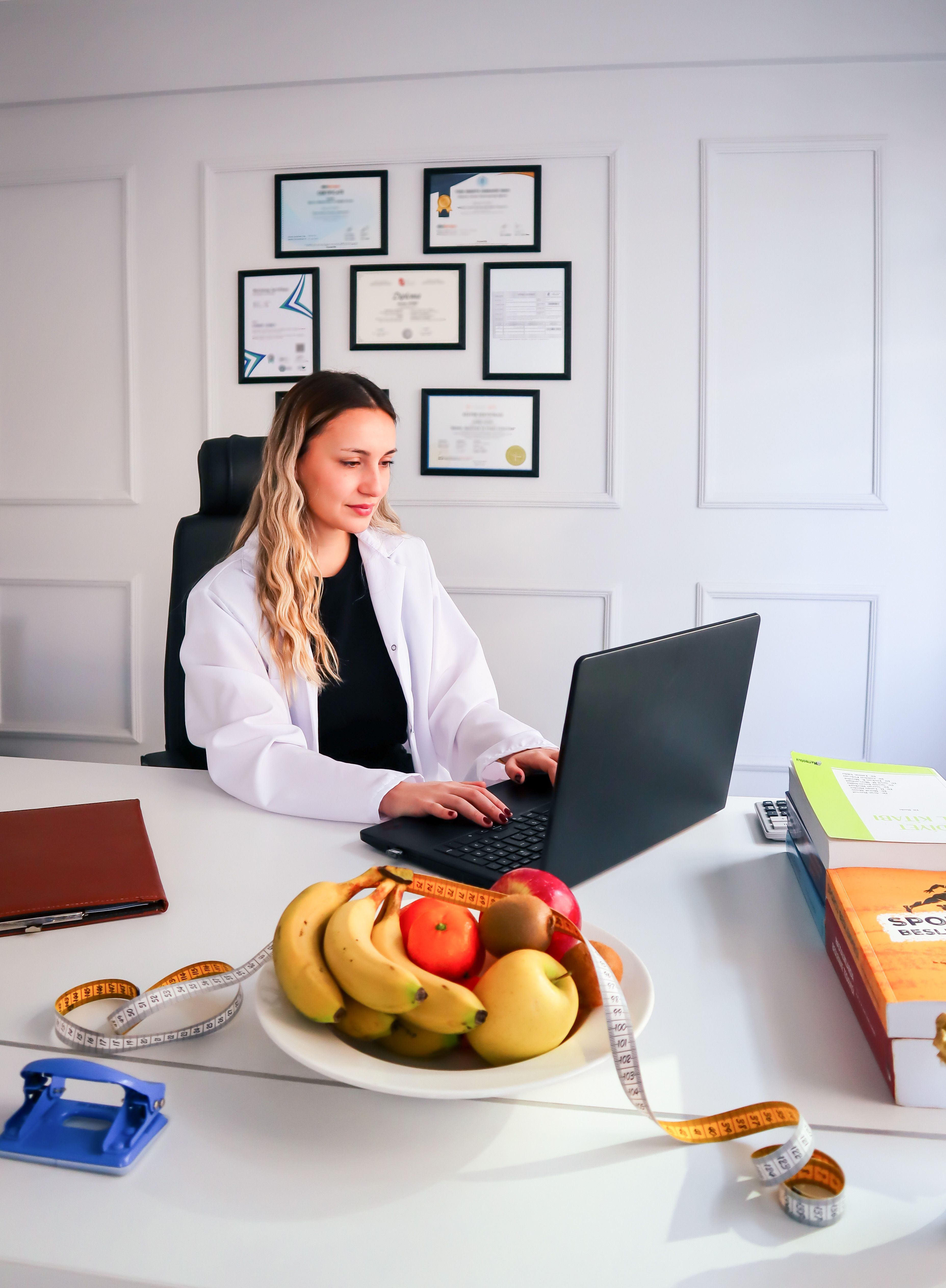 Healthcare professional working with credentials and professional records