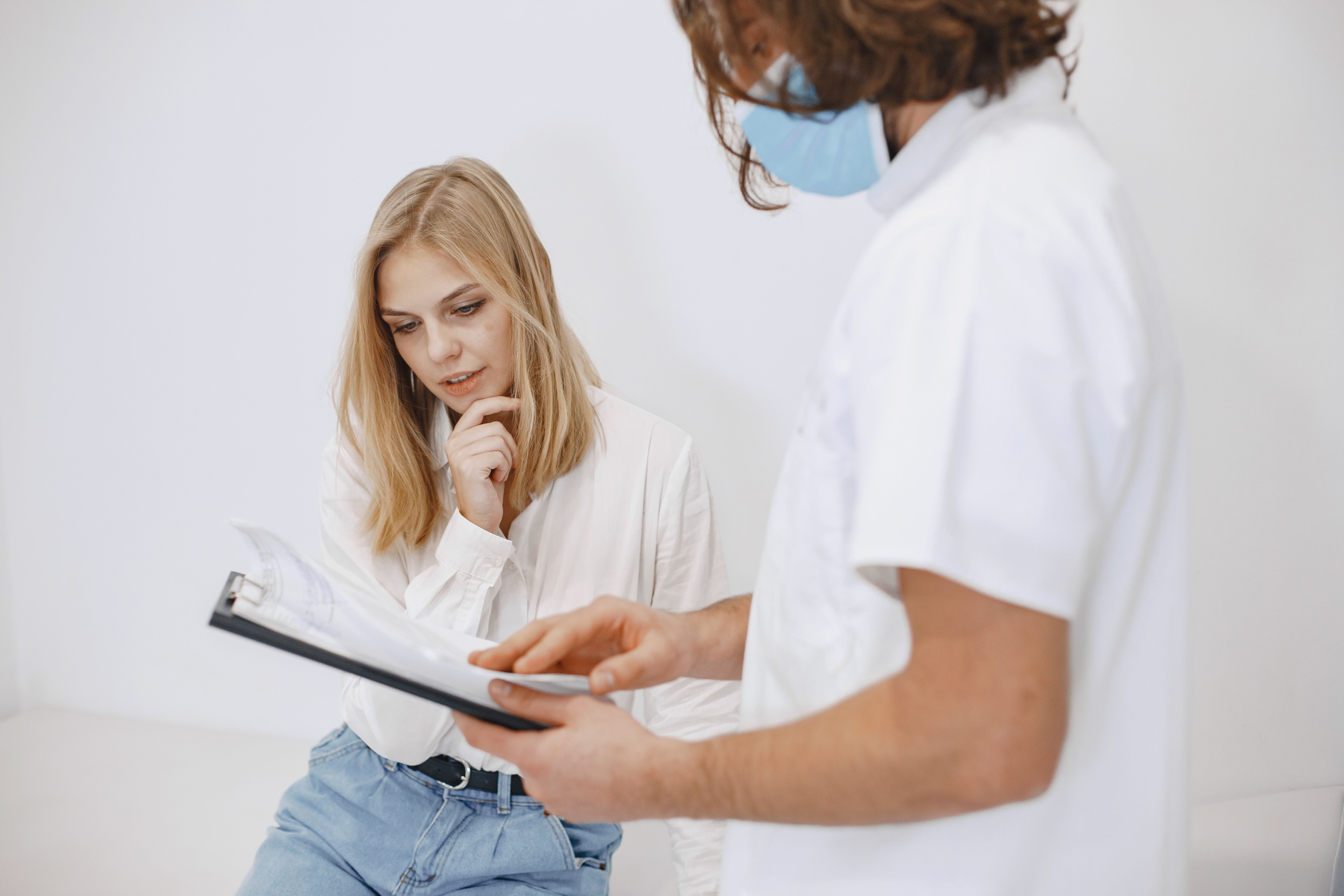 Healthcare professional consulting with a participant