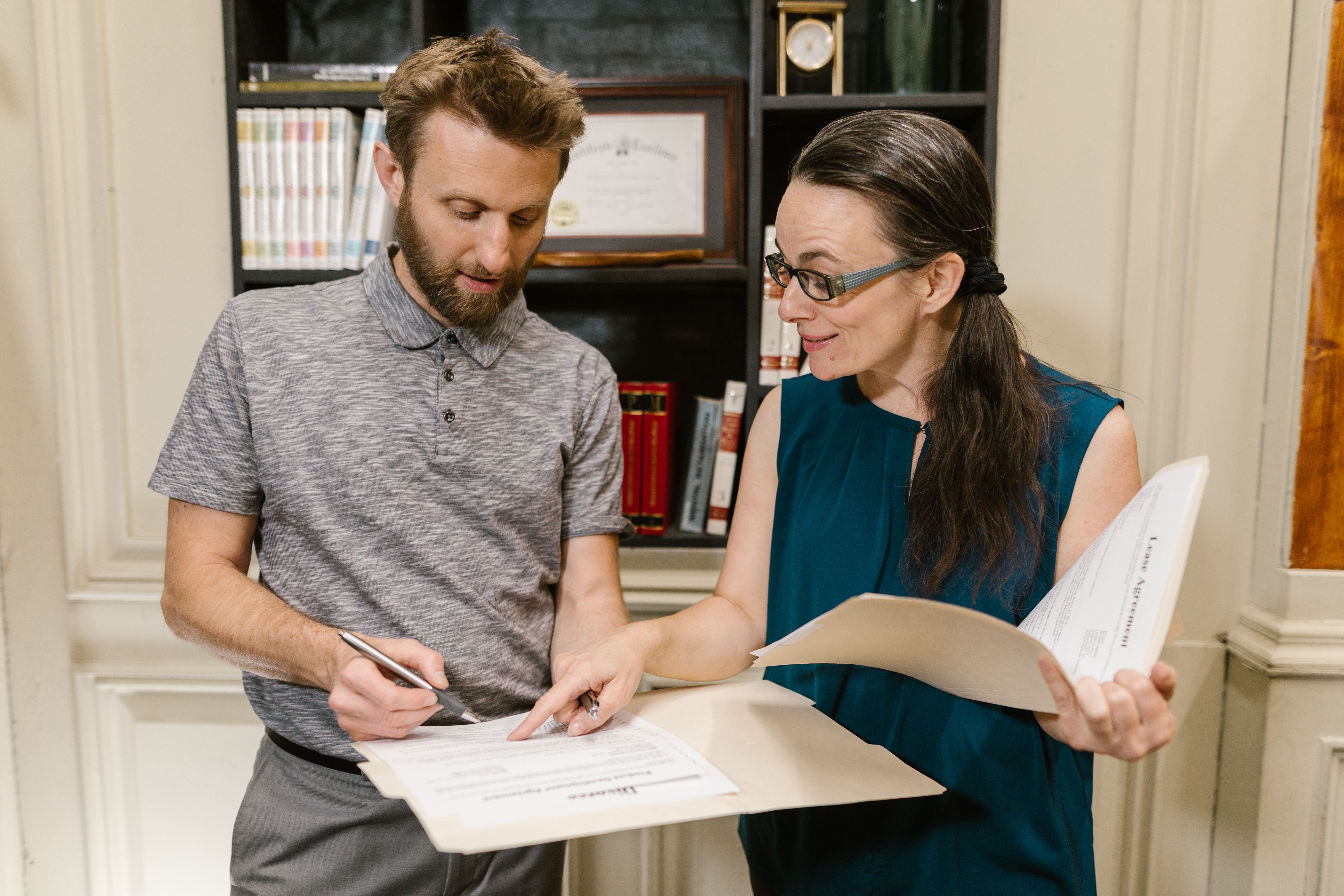 Professionals reviewing governance and policy documents