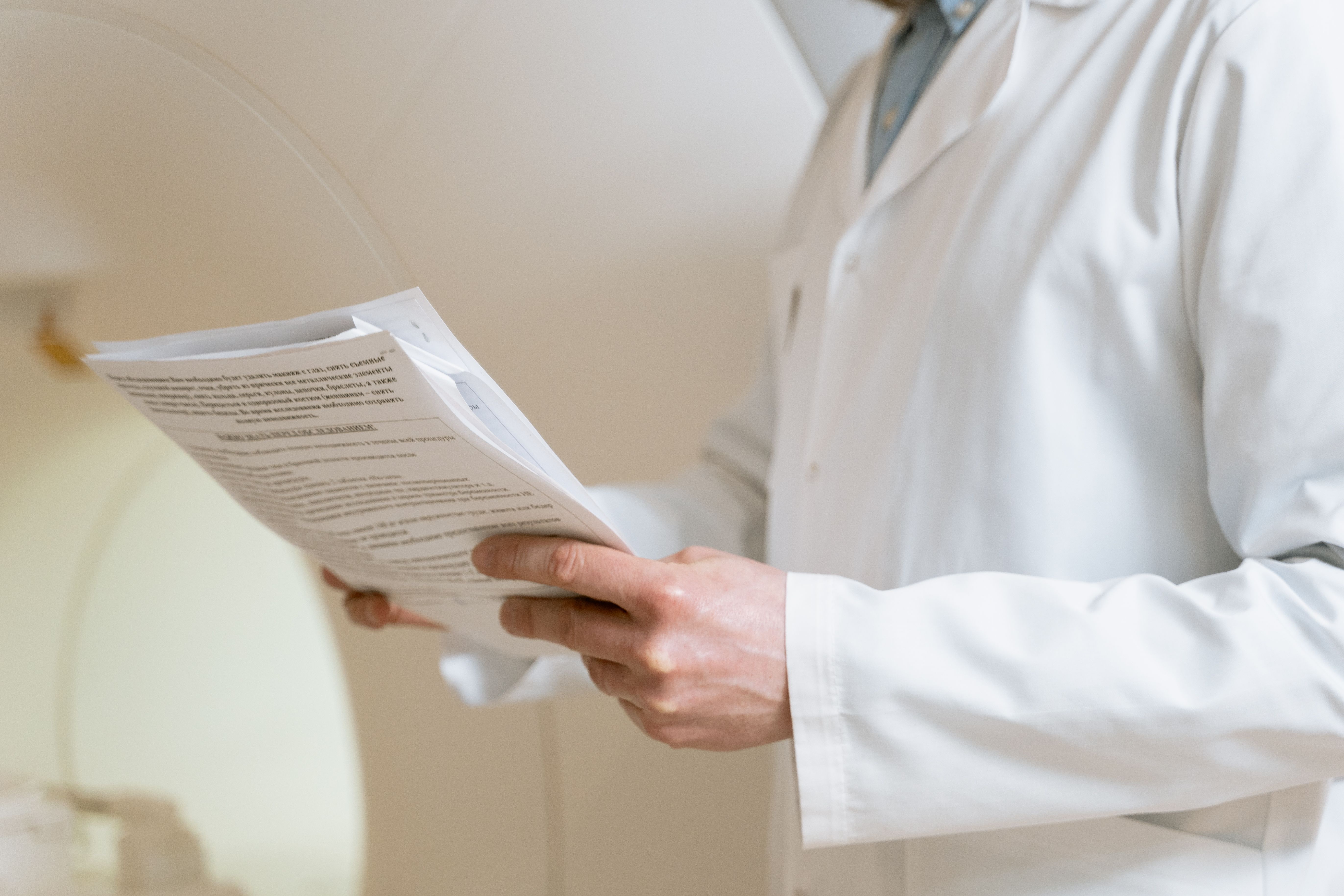 Healthcare professional reviewing certification documents