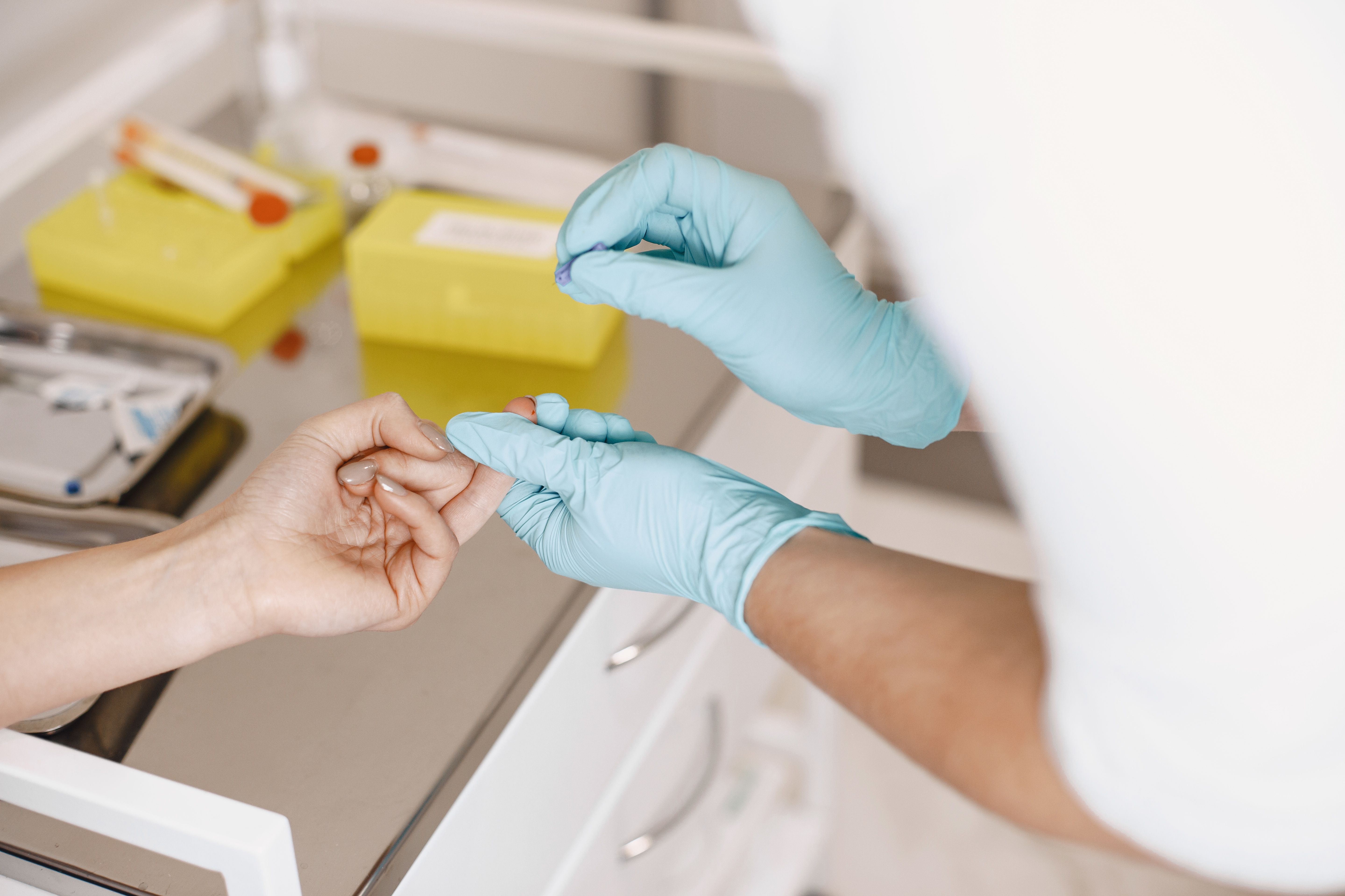 Healthcare professional collecting a blood sample