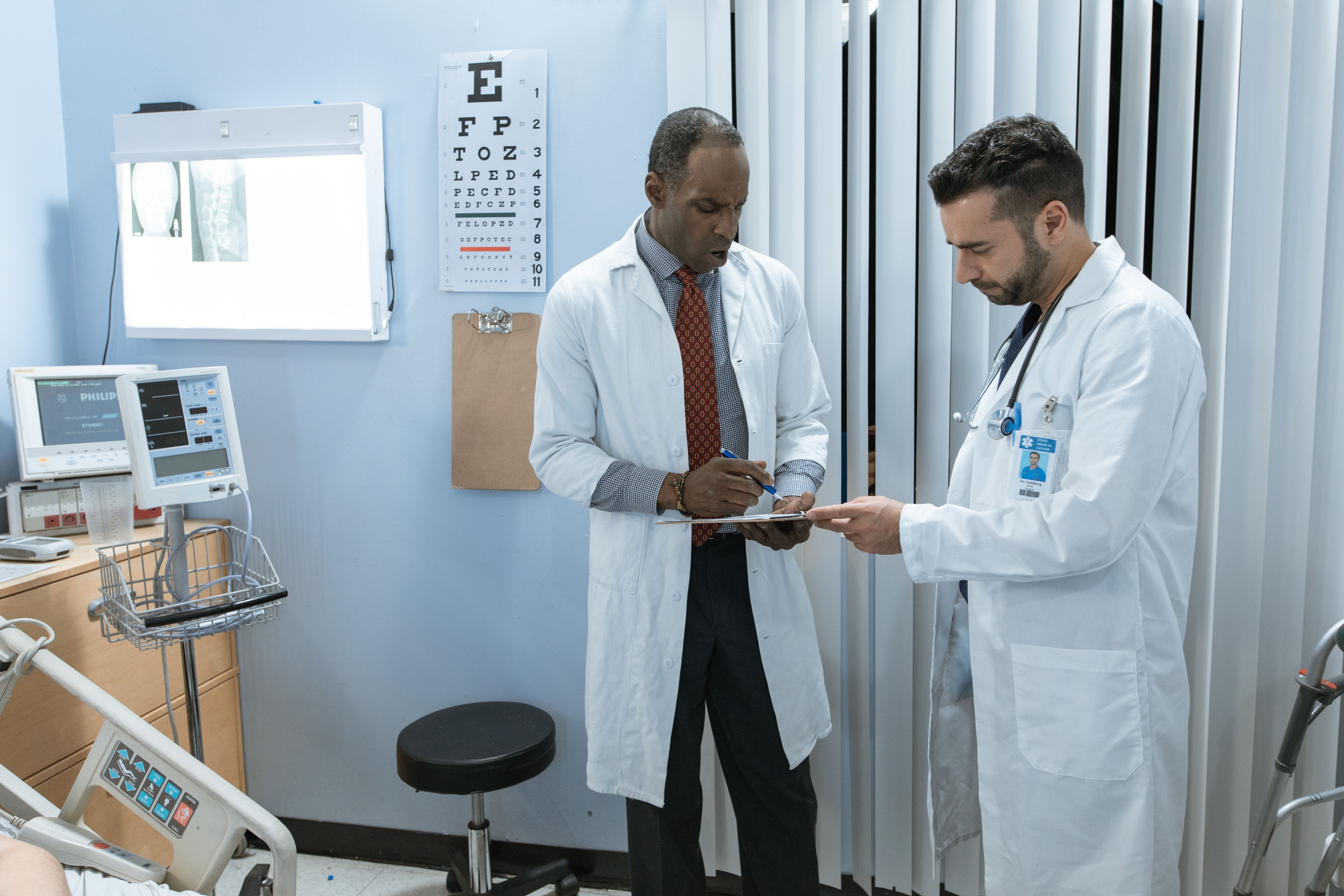 Healthcare professional reviewing quality and accreditation records