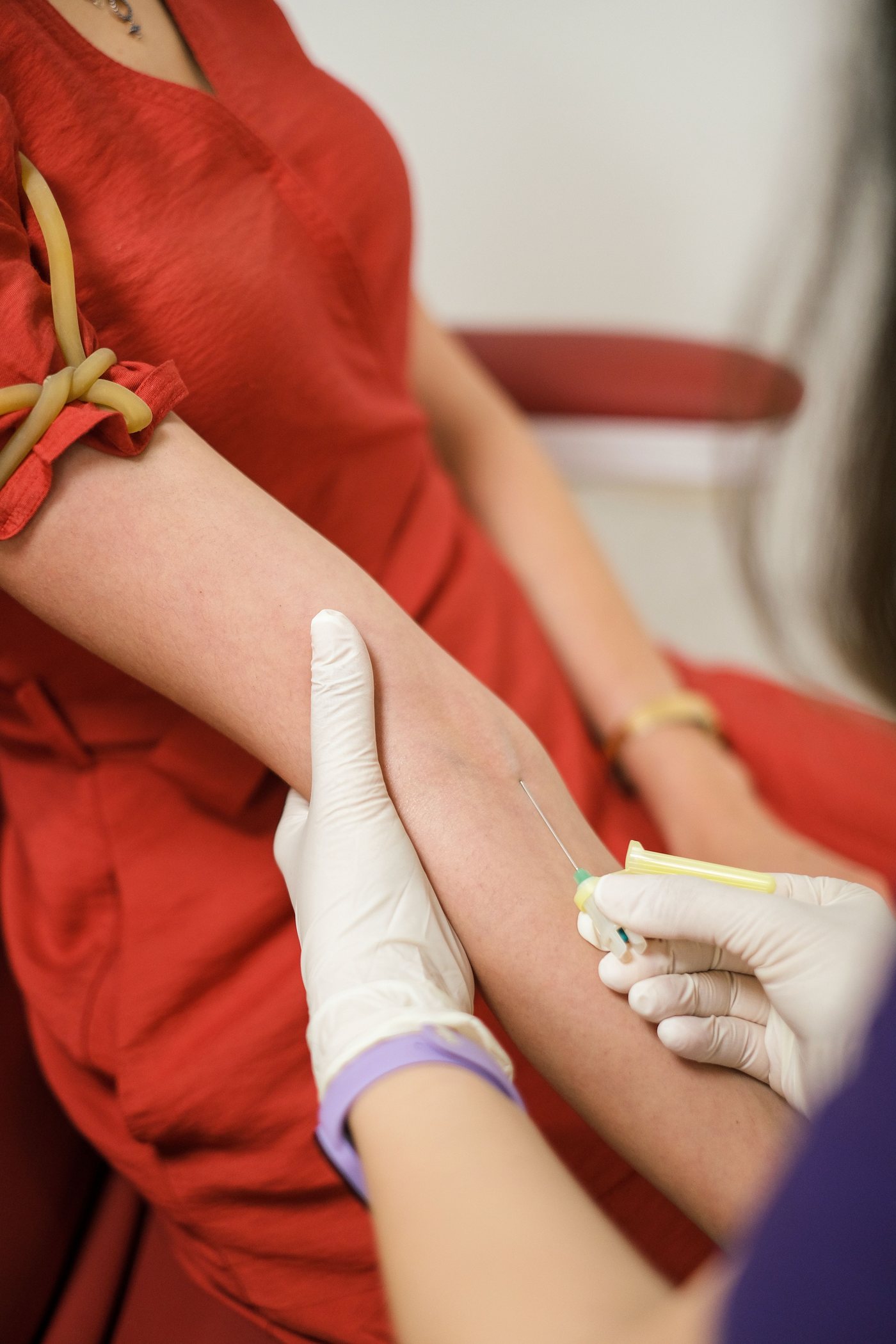 Phlebotomy professional drawing a blood sample